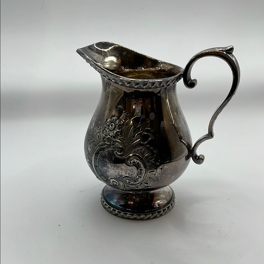 Wallace Silver creamer with Floral Design